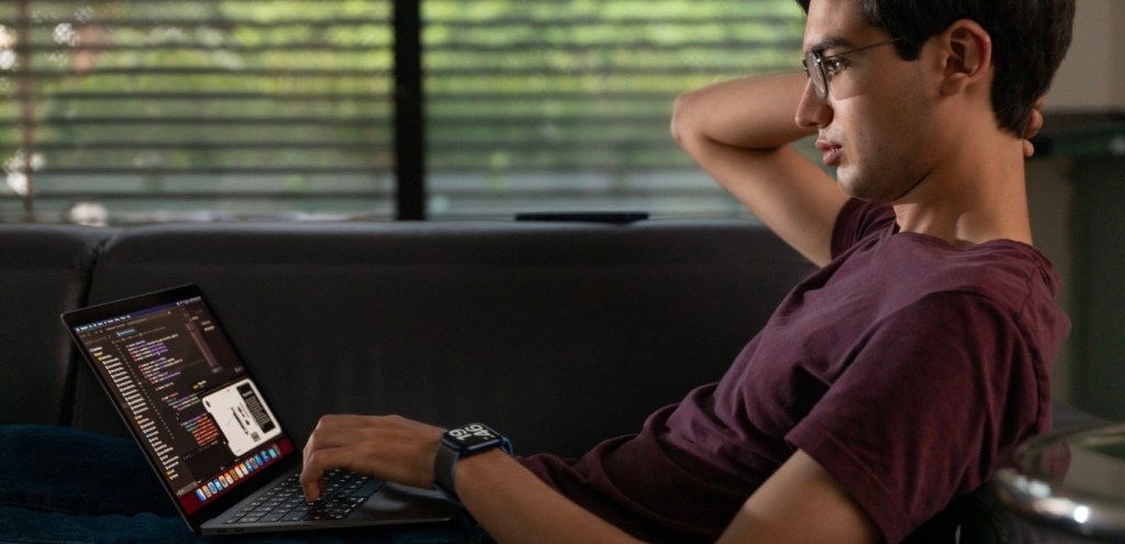 A college student using macbook