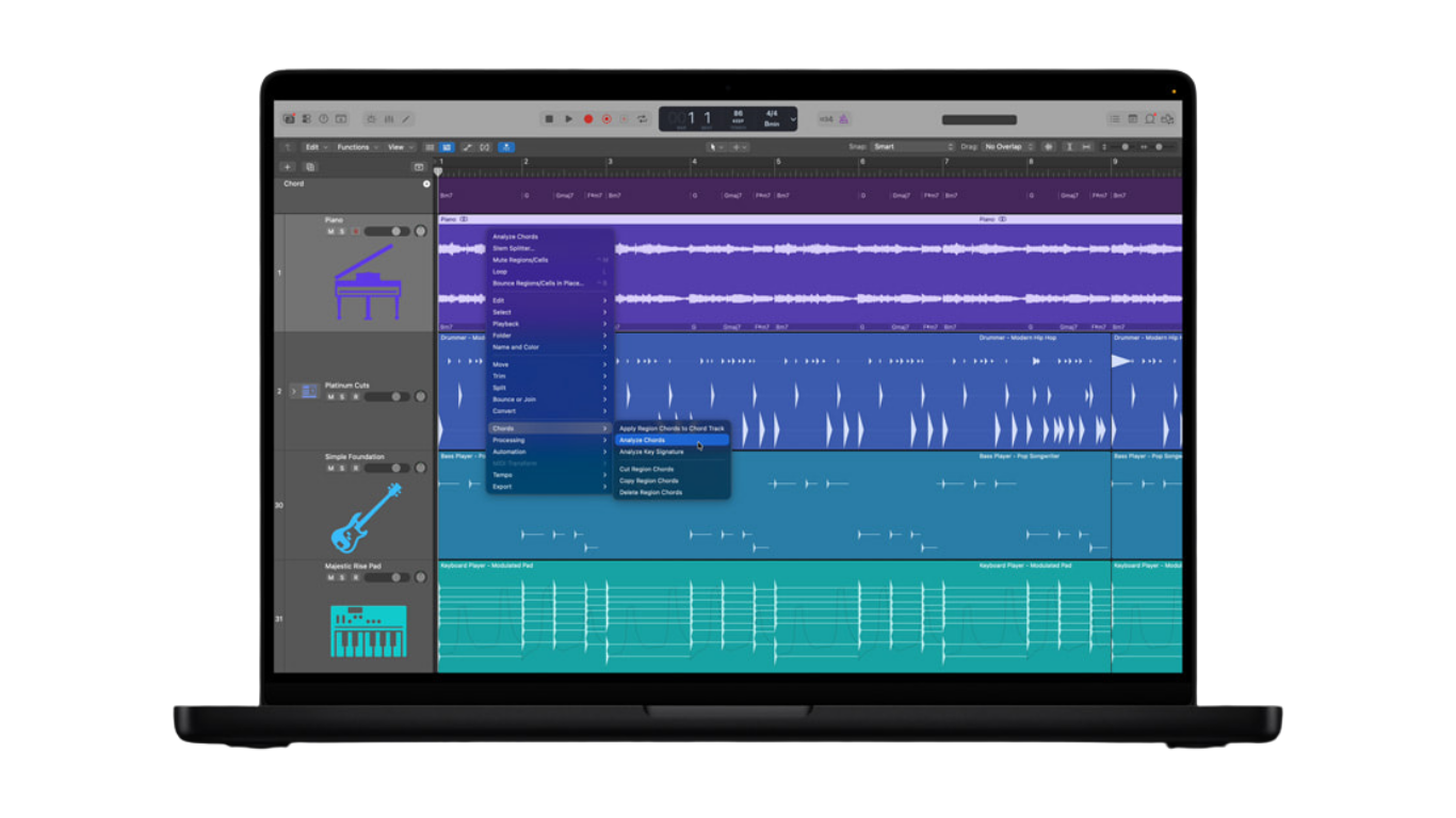 a macbook displaying logic pro app