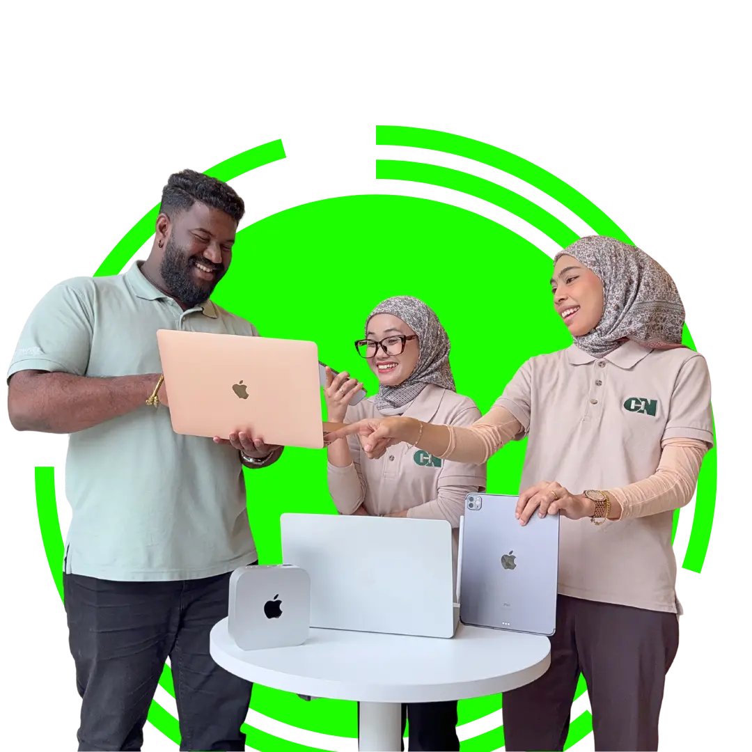 1 chn holding macbook and other 2 discussing with it happily