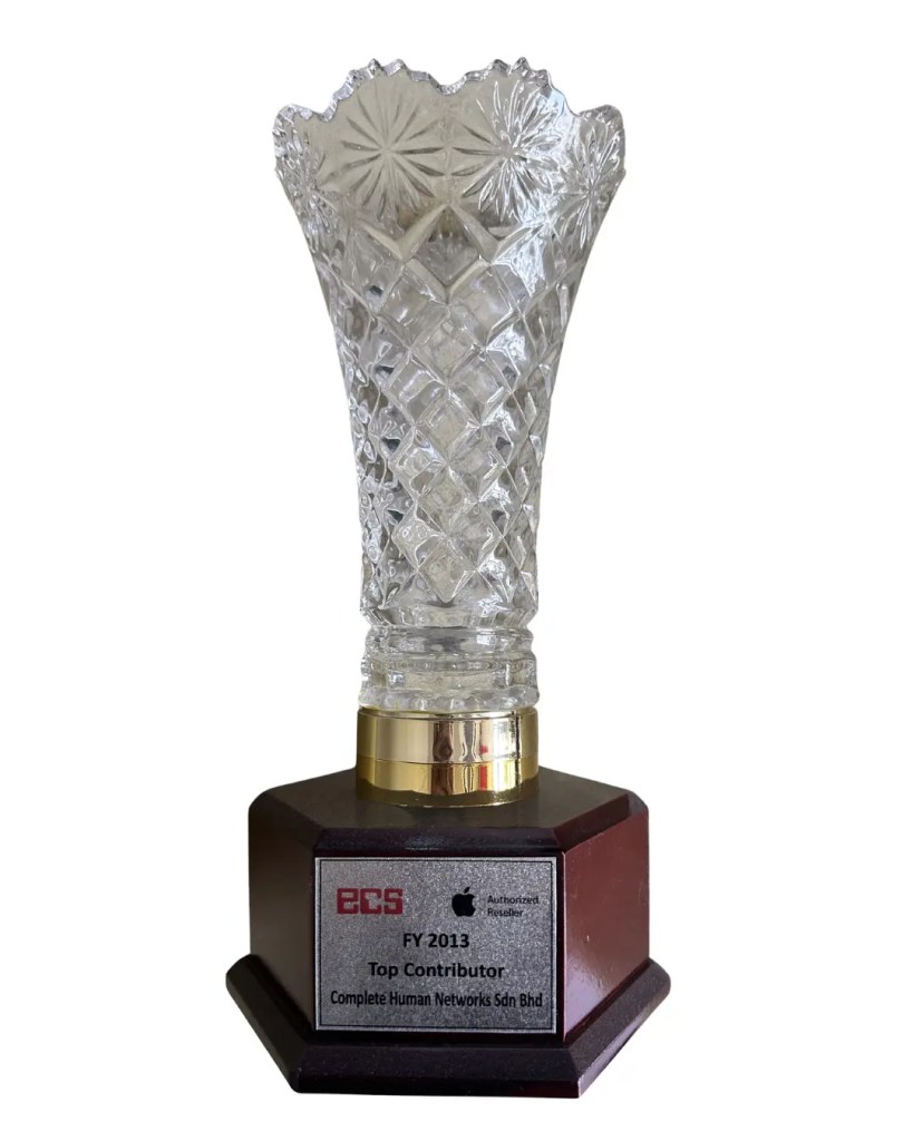 ECS FY 2013 Top Contributor trophy to complete human network