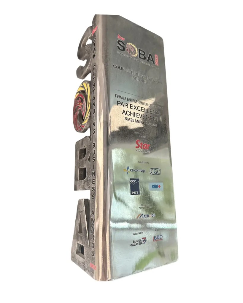 Entreprenuer of the year soba trophy to complete human network