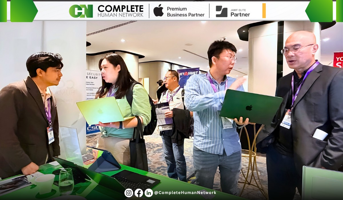 complete human network staff managing macbook neo for business