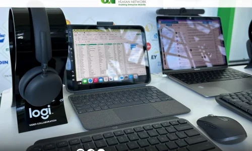 Two ipad opening showcasing at an event about device as a service